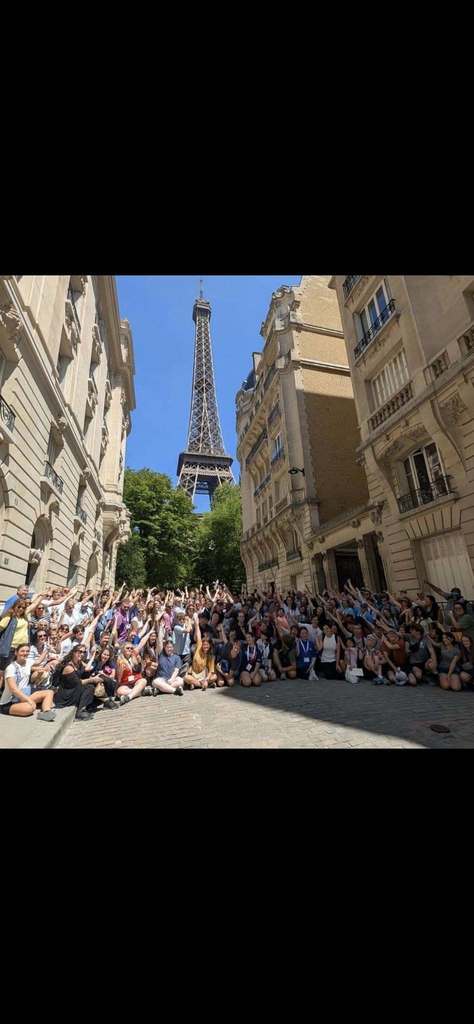 nc music ambasadors in front of eiffel tower