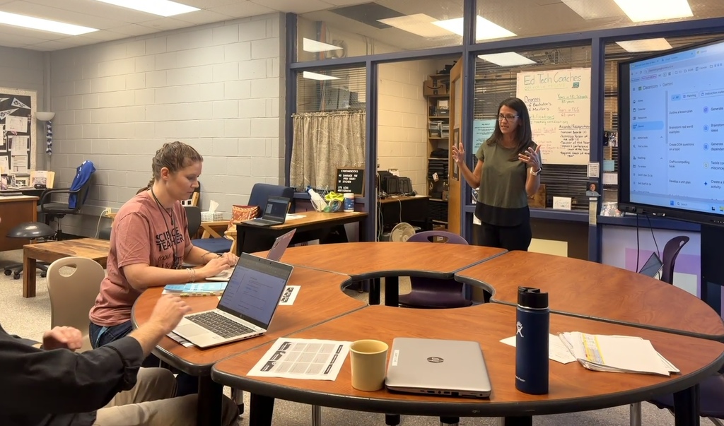 Mrs. Bailey working with staff