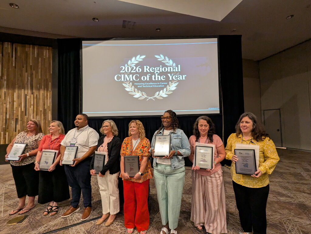 TCS Tanya Melton holds award