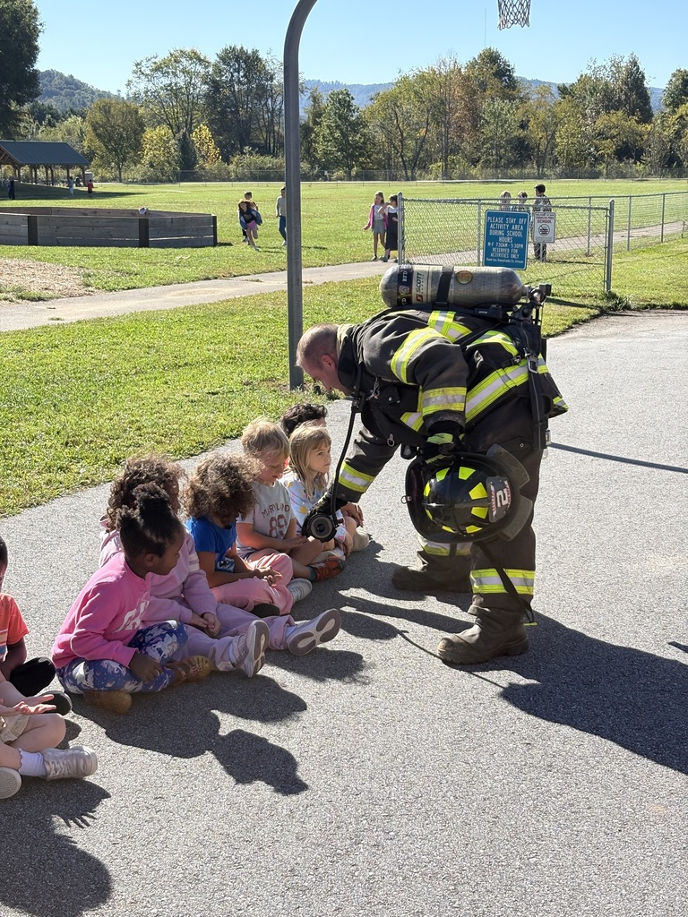 Students get to feel what a fire fighters gear feels like.