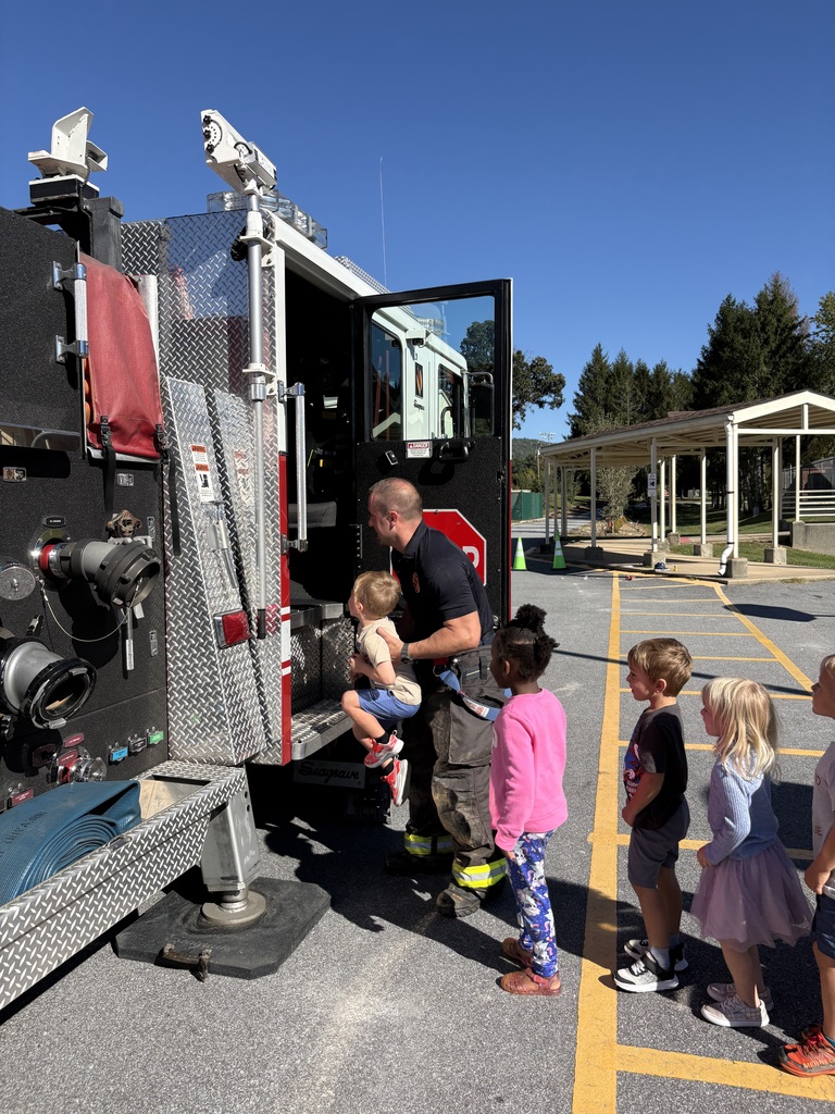 Students get to climb into the firetruck.
