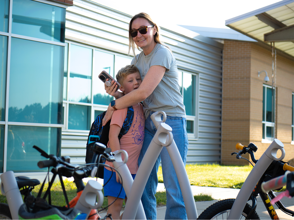 Student with parent on first day of school