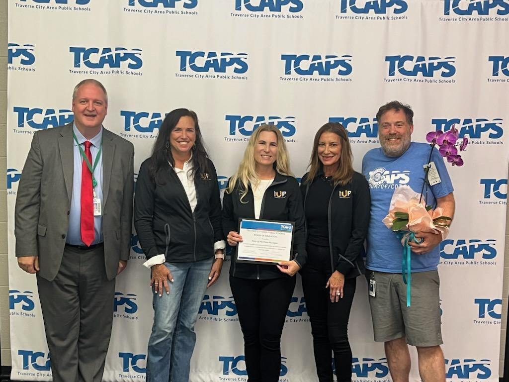 Step Up Northern Michigan pictured with TCAPS Board President and Superintendent