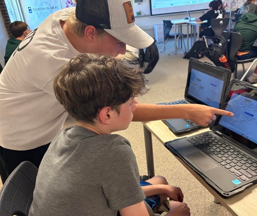  Two students learning at a computer