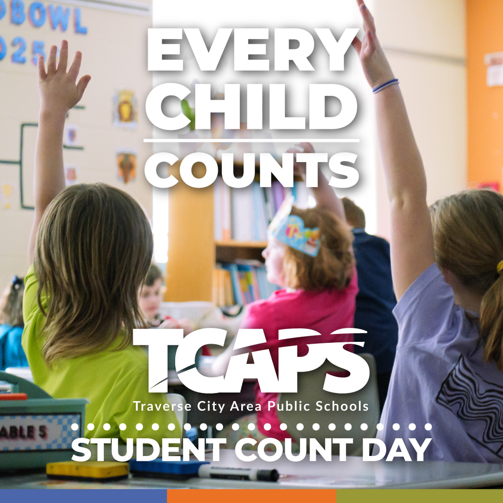  A promotional graphic for Student Count Day. The image shows a classroom with two students in the foreground raising their hands. Large text overlaid on the image reads "EVERY CHILD COUNTS" and "TCAPS, Traverse City Area Public Schools" with the words "STUDENT COUNT DAY" at the bottom.