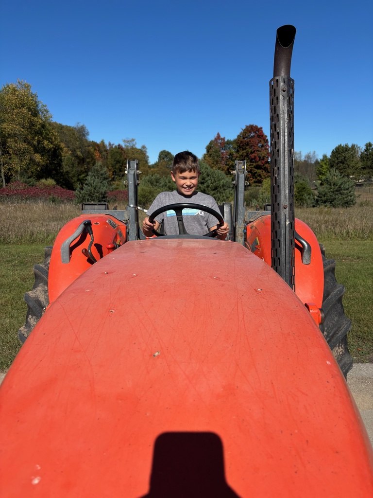 Kid on tractor