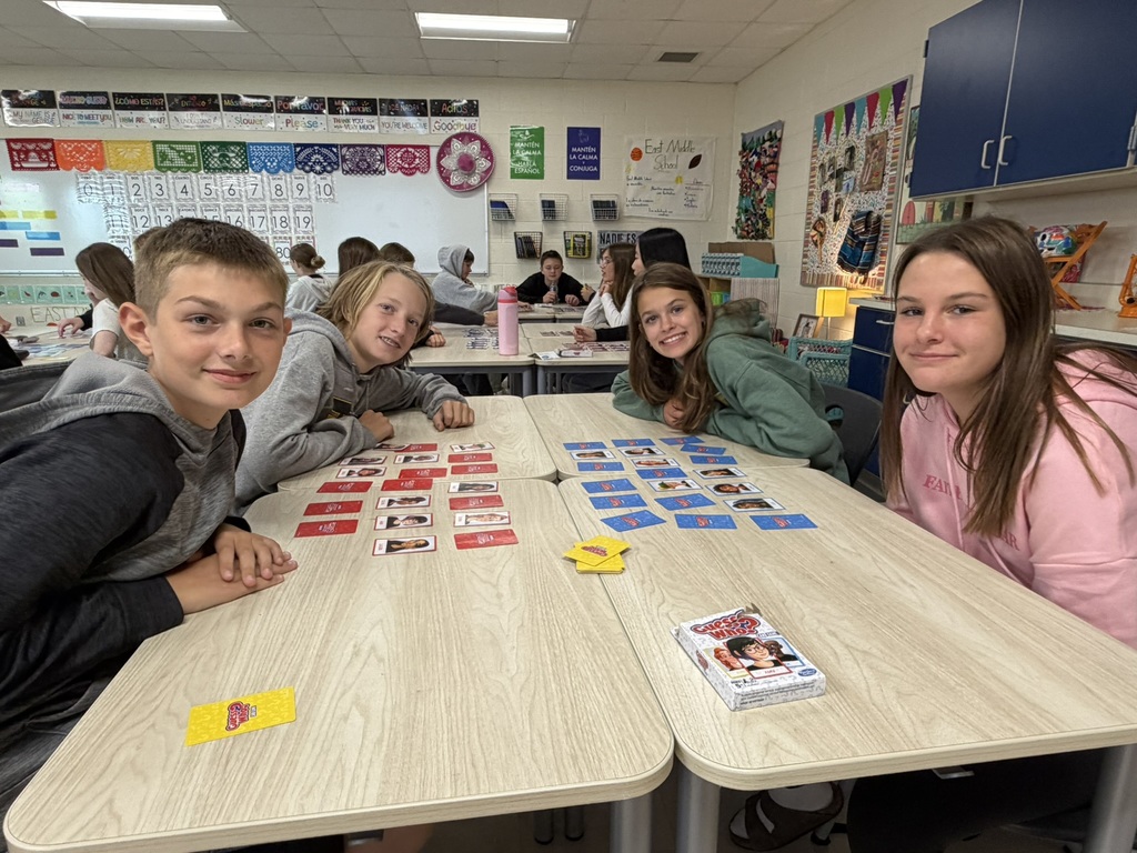students playing guess who