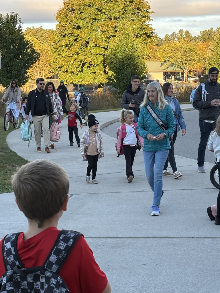 Students and adults walking toward Eastern