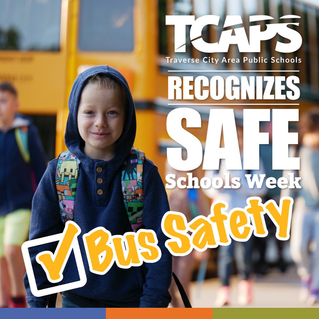 Smiling student and school bus. TCAPS recognizes Safe Schools Week: Bus Safety.