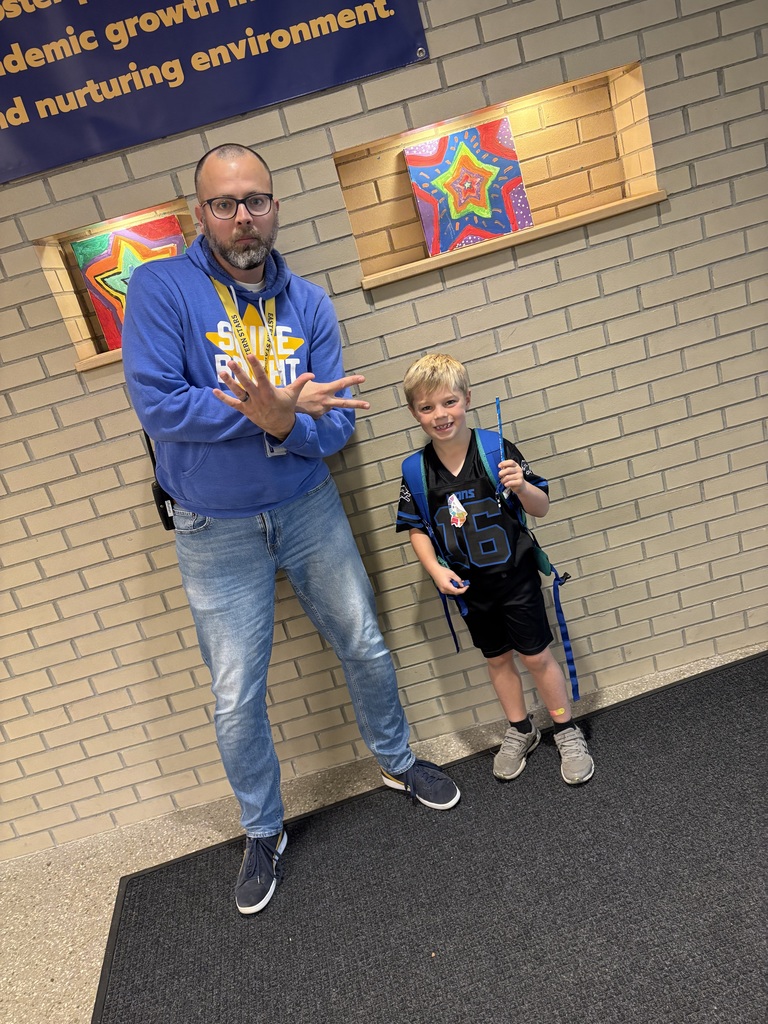 Mr. Swegles with a star student