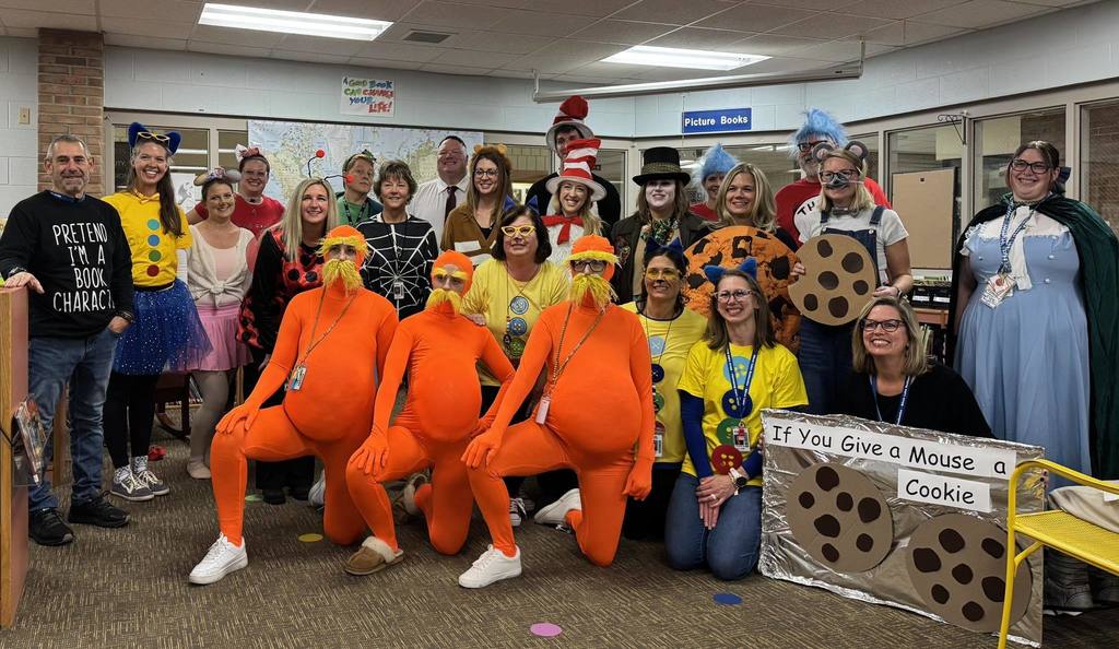 Silver Lake staff dressed as book characters, including the Lorax, Cat in the Hat, and costumes from If You Give a Mouse a Cookie.