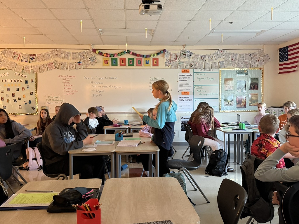 students readying poems