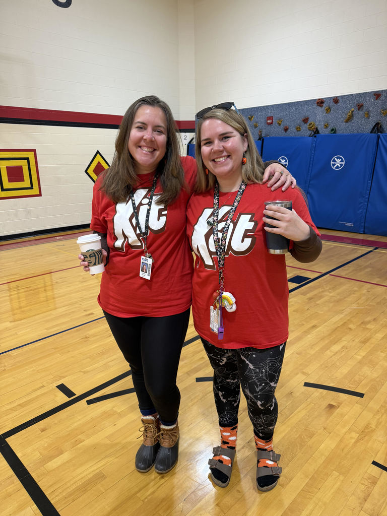 First grade teachers dressed as Kit Kat