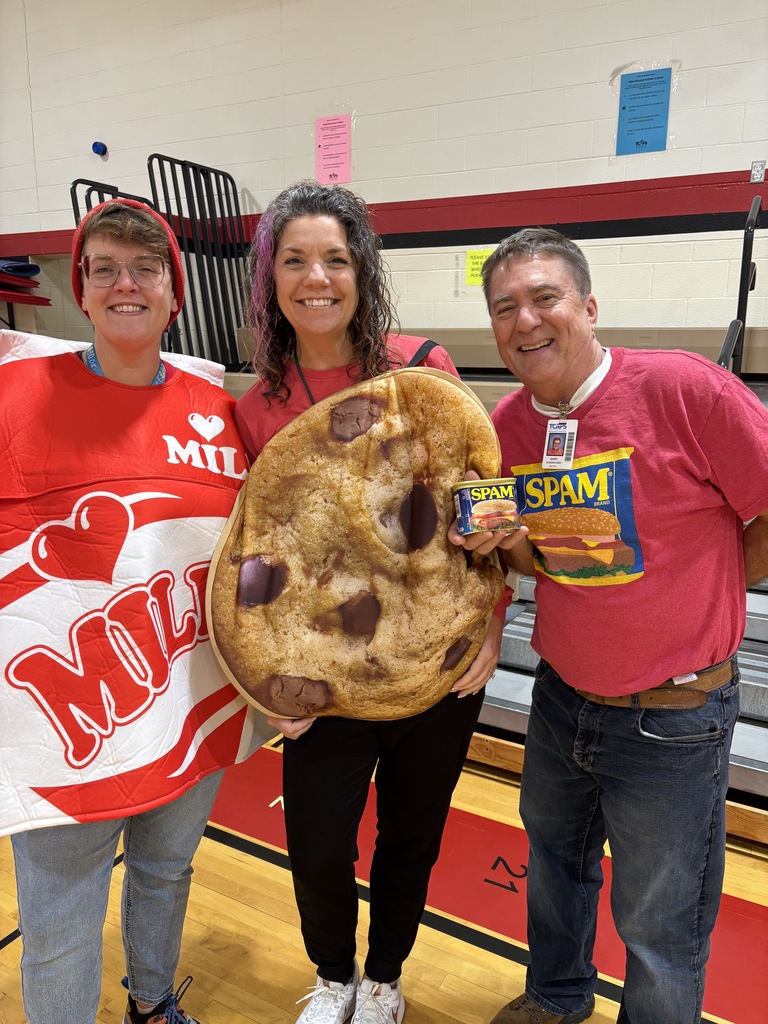 Staff dressed as milk and cookies and Spam