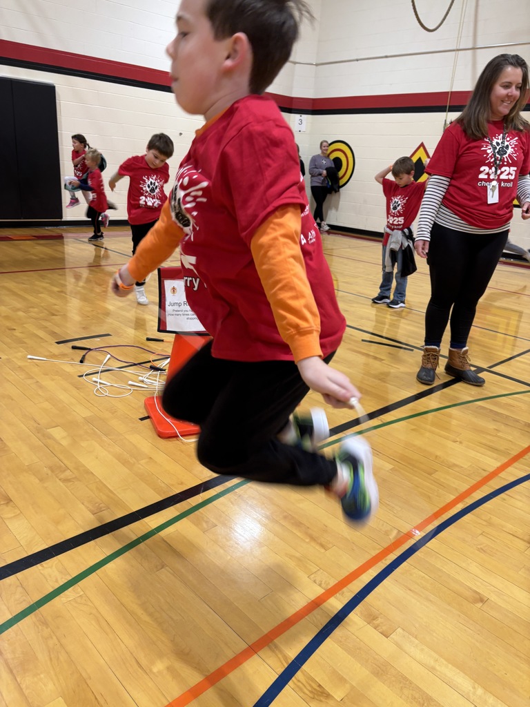 Boy midair jumping rope