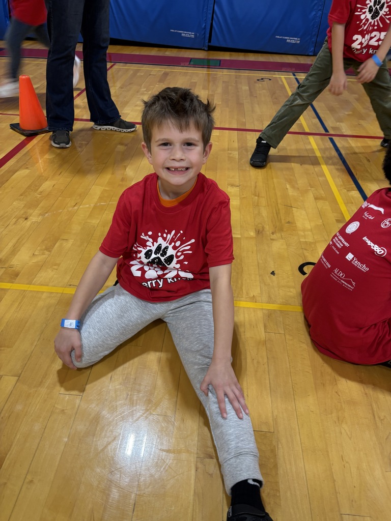 Boy doing a seated stretch