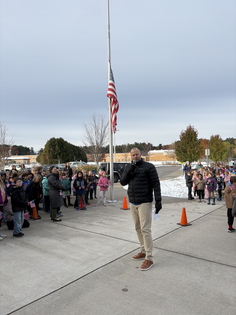 Principal Swegles leading students in the Pledge of Allegiance