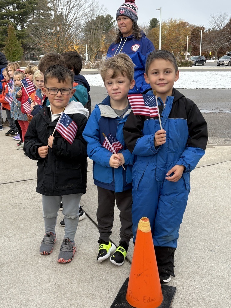 students holding flags