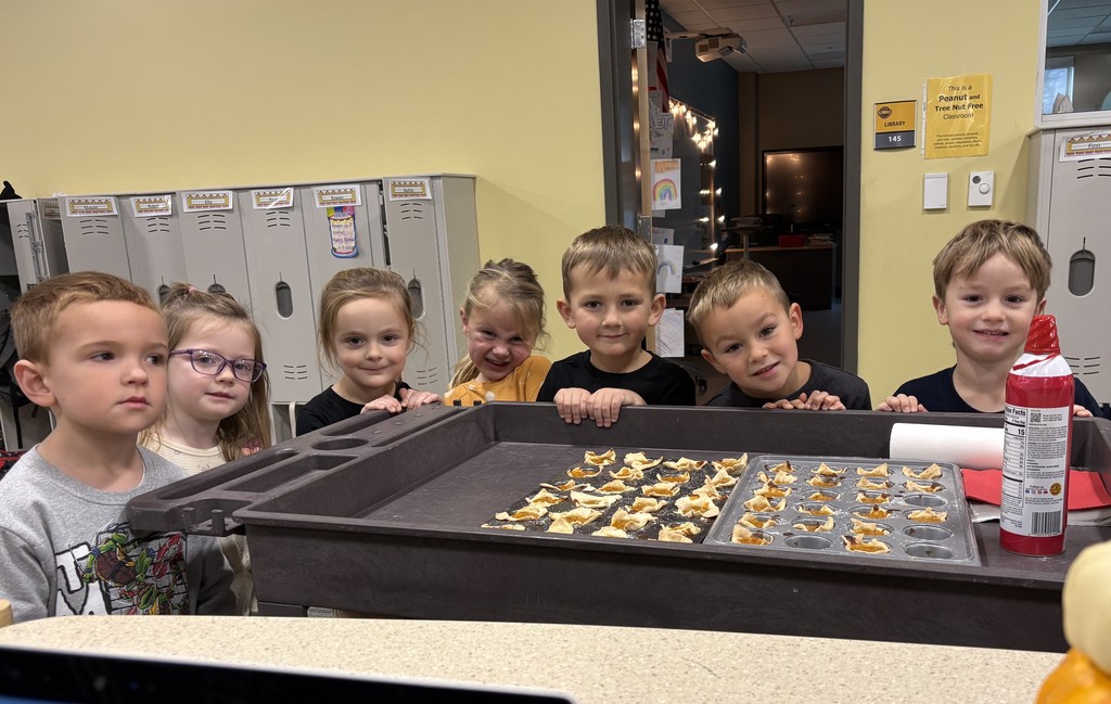 Preschoolers with the mini pumpkin pies they made!