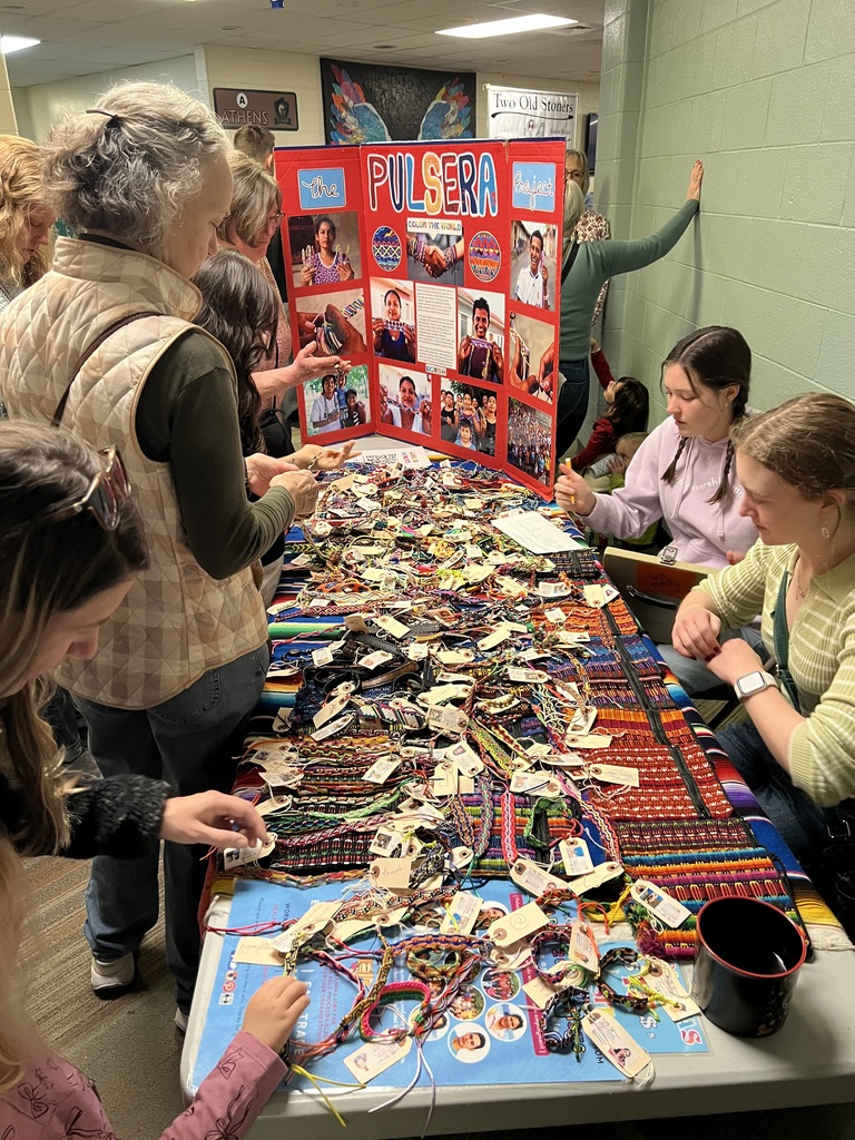 Photo of students selling the items for the fundraiser 