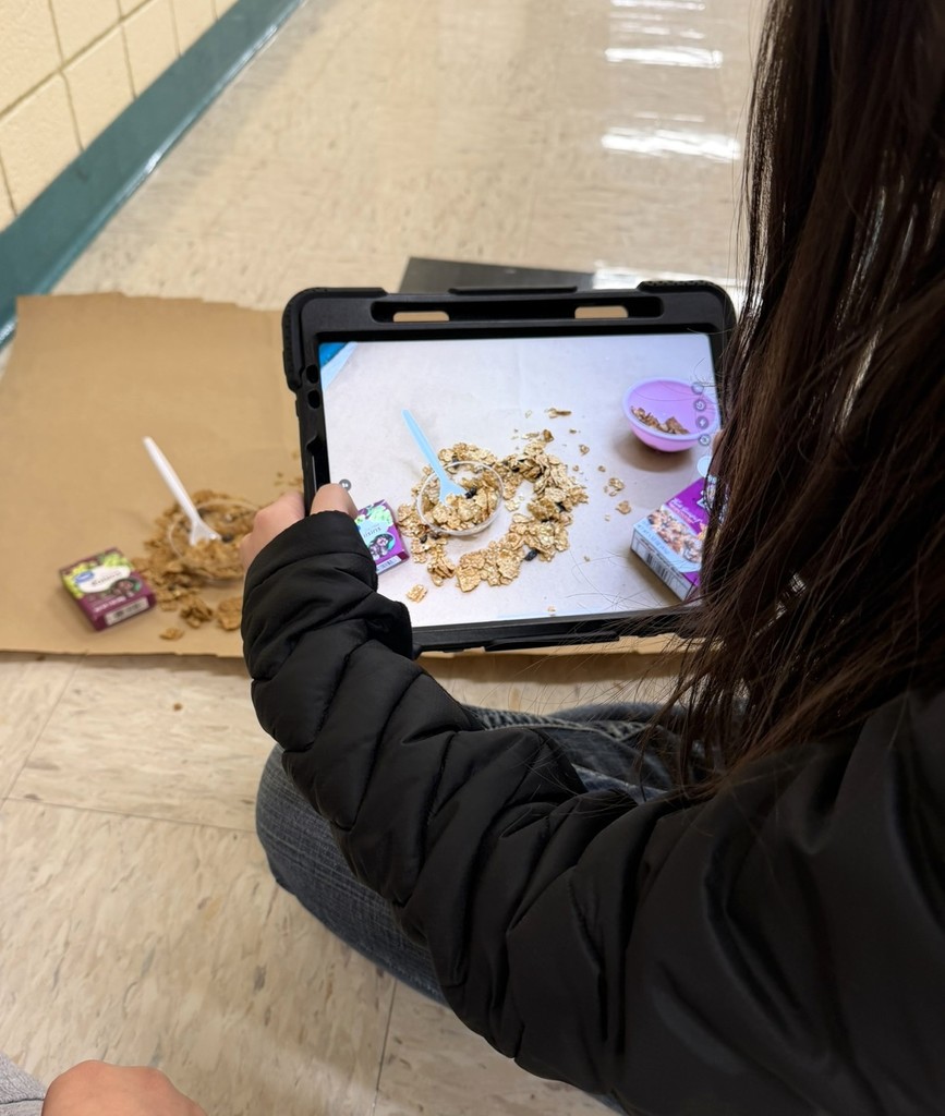 a student taking a photo of cereal