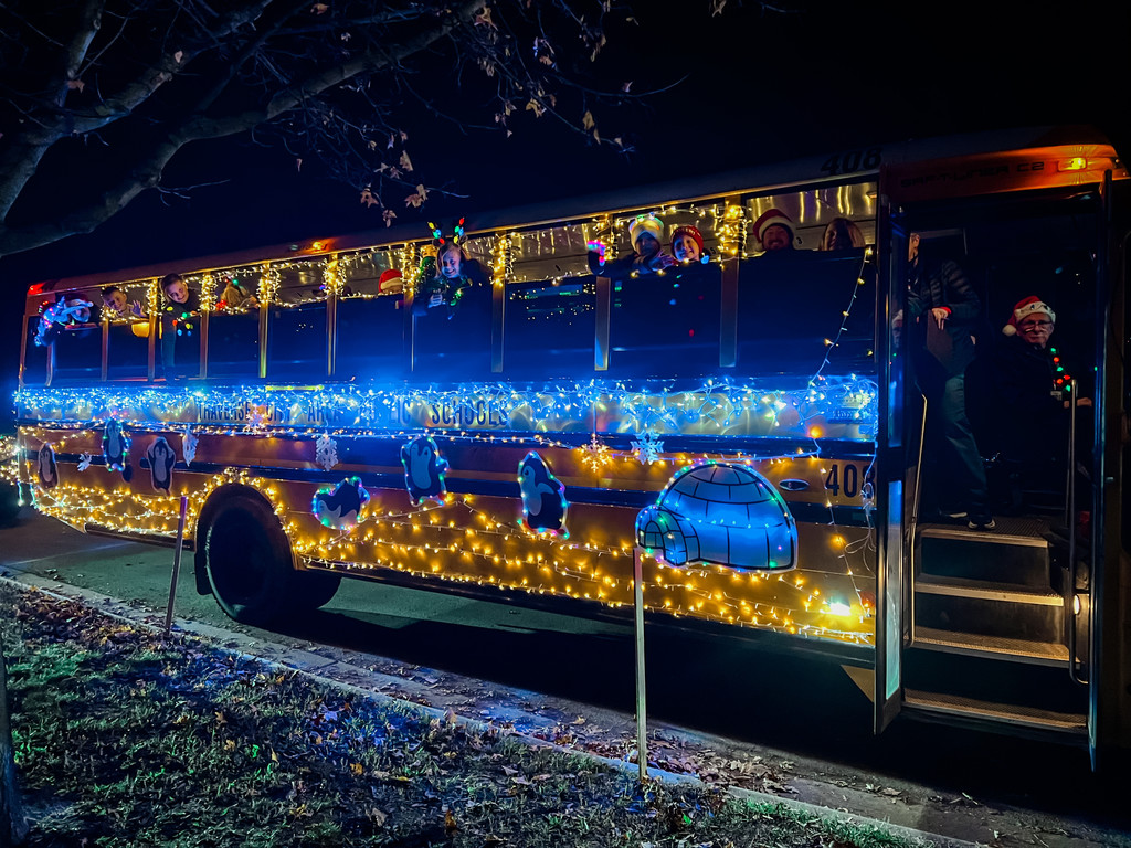 TCAPS Students in the bus decorated for the Light Parade