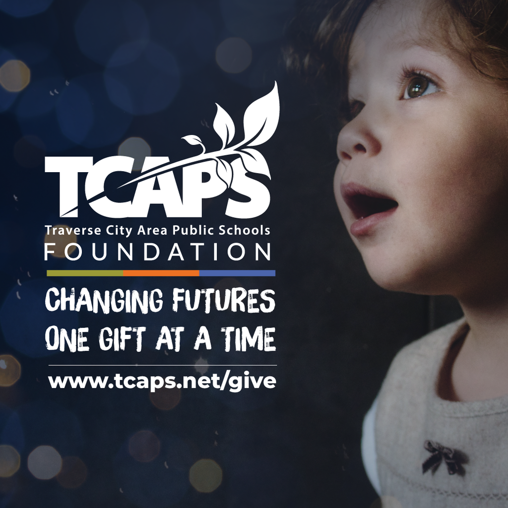 TCAPS Student looking out in awe with foundation logo.