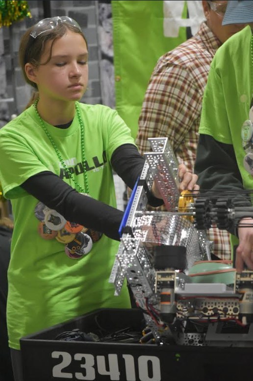 West Middle school student with her robotics design