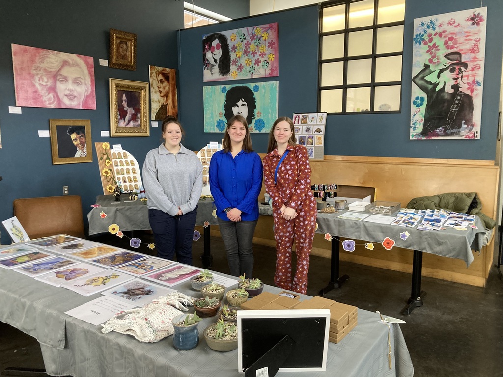 Photo of students selling art