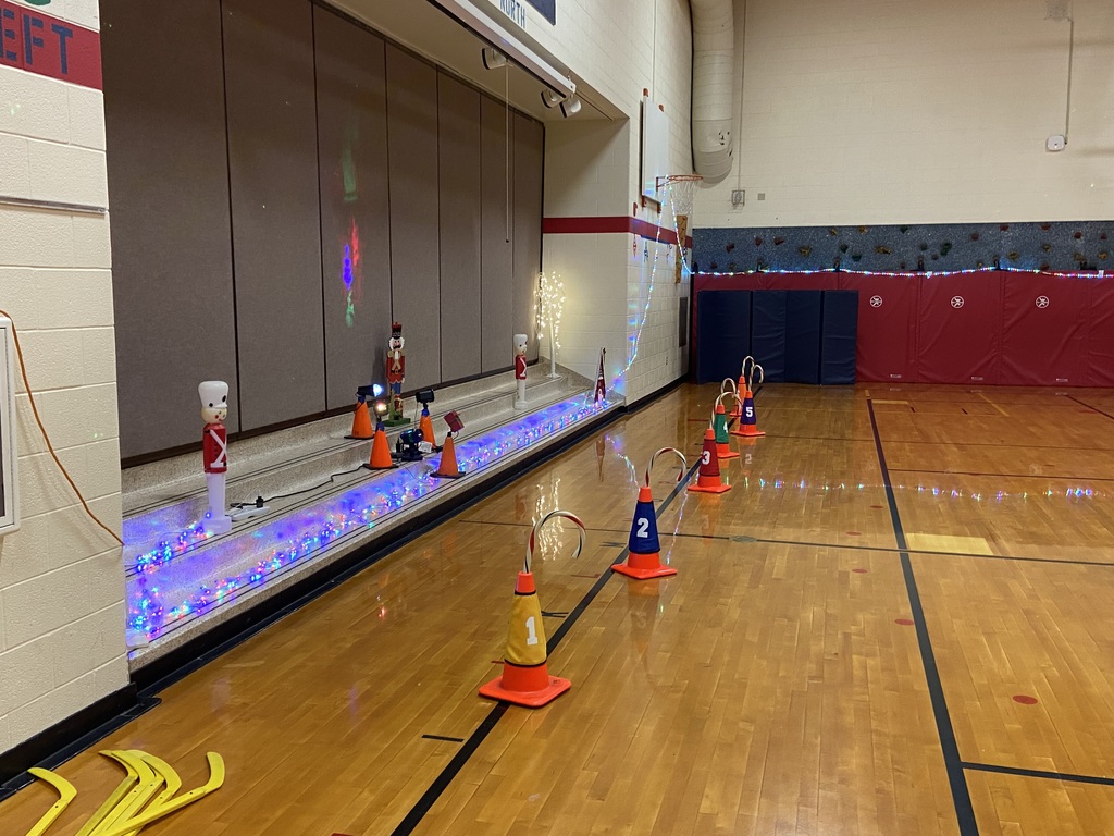 Christmas obstacle course, cones in a line that are numbered with candy canes sticking out of them.  Toy soldiers on the steps in the gym..
