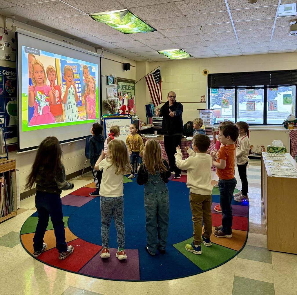 Junior Kindergarten students dancing in a group