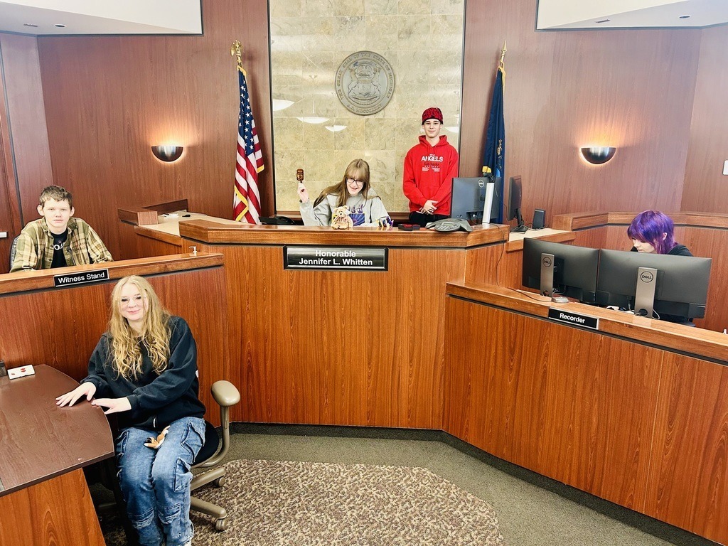 Traverse City High School students sitting in the Traverse City Courthouse