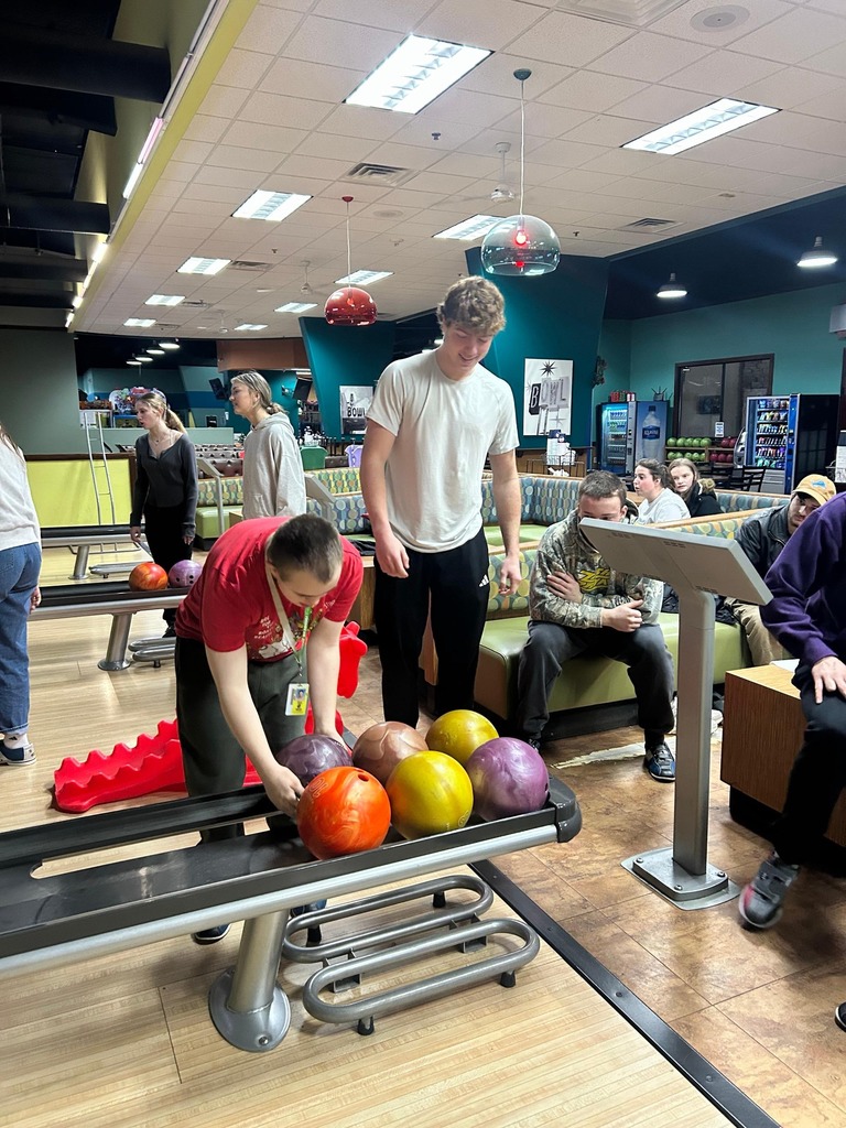 Students bowling together