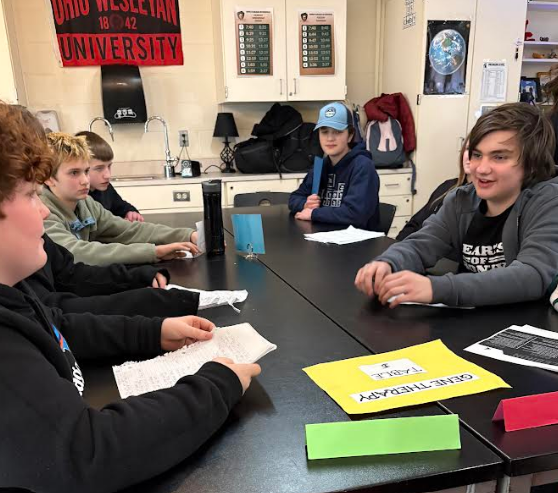 Group of students engaged in debate