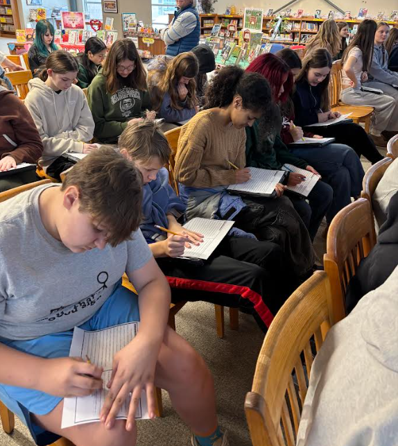 Students writing during LMC workshop