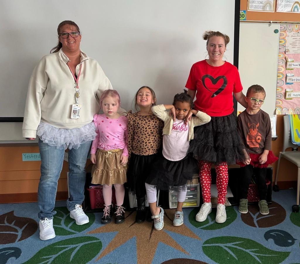 Staff and students wearing tutus