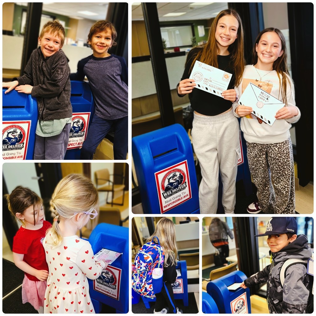 students putting letters in their school mailboxes