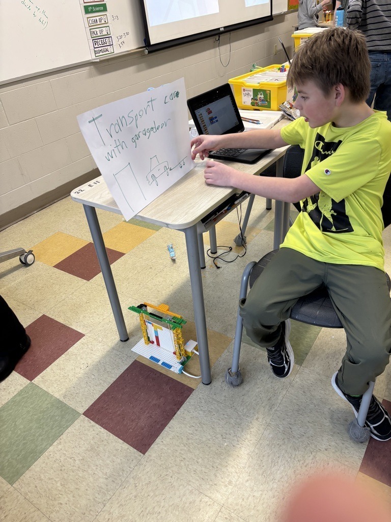 Student demonstrating his project