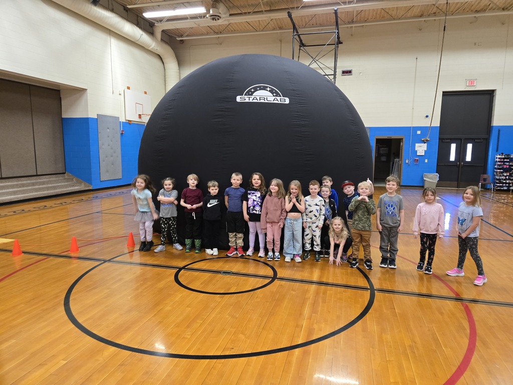 students standing in the gym