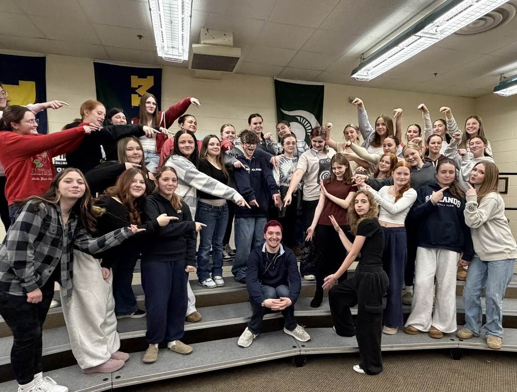 8th grade treble choir students with their teacher.