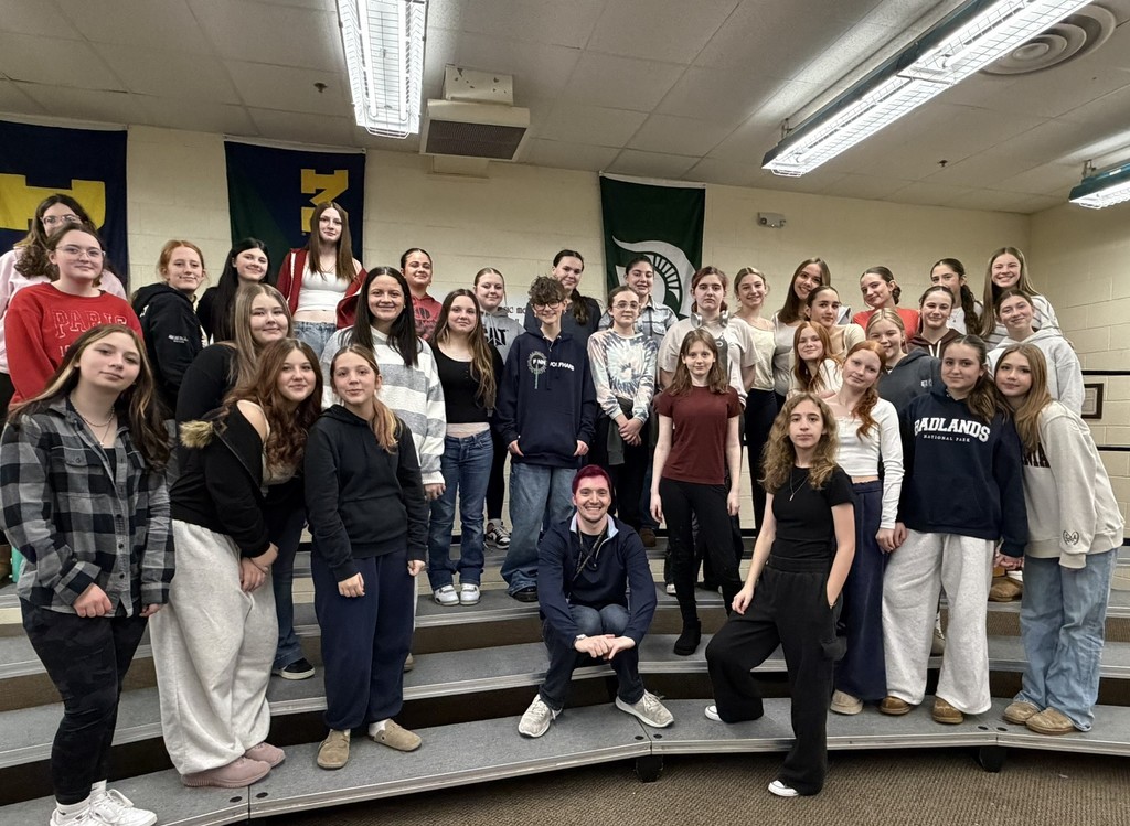 8th grade treble choir students with their teacher.