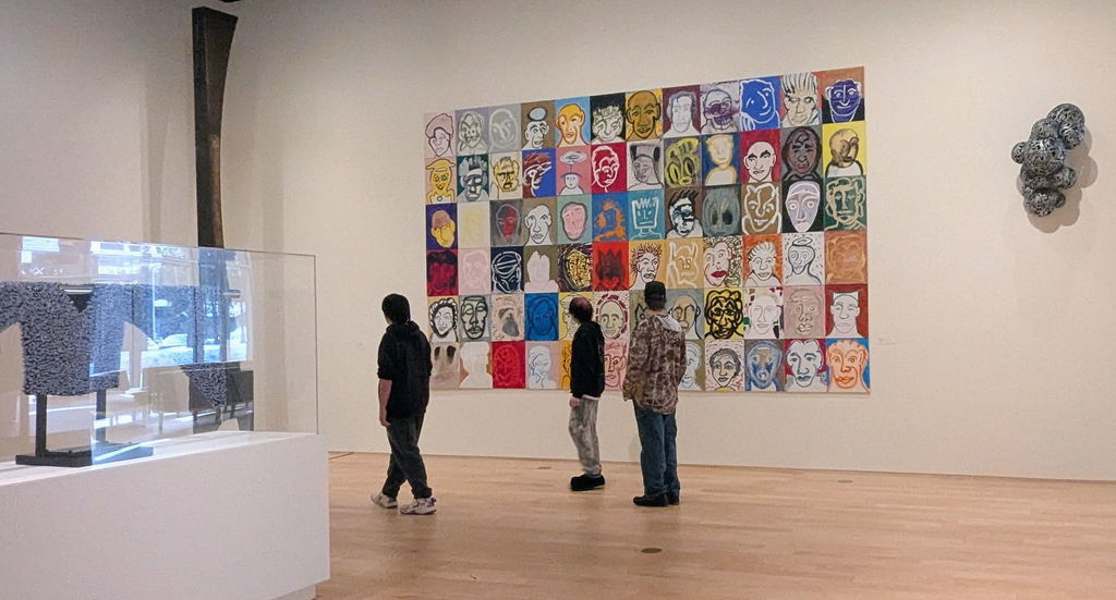 TCHS students enjoying artwork at the Dennos Museum Center