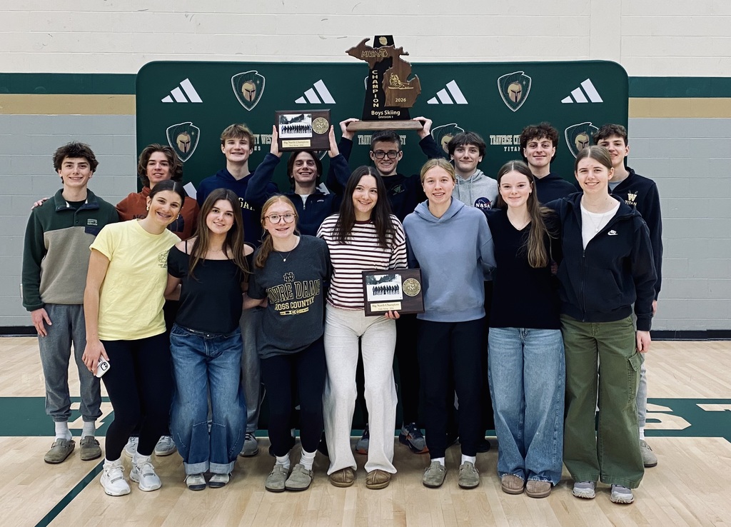 Photo of West Senior High ski team students holding the trophy.