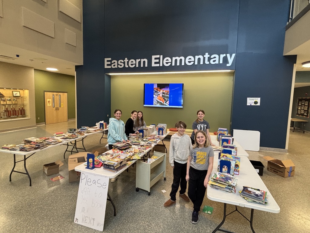 Members of Eastern Elementary Student Council getting our book swap. 
