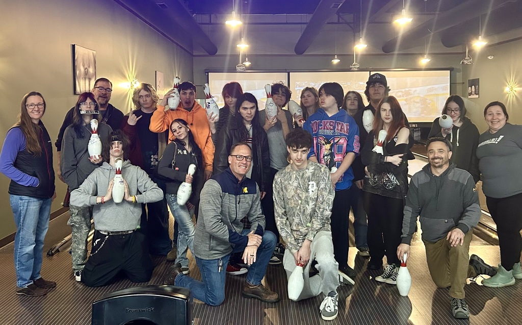 TCHS students and staff pose for a group photo at Incredible Mo's 