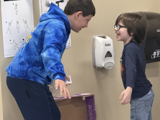 Student mentor interacting with a younger student.