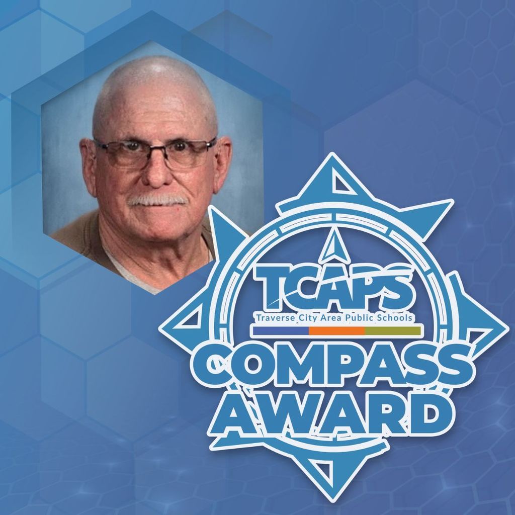 A blue background features a man in glasses and a logo for the TCAPS Compass Award.