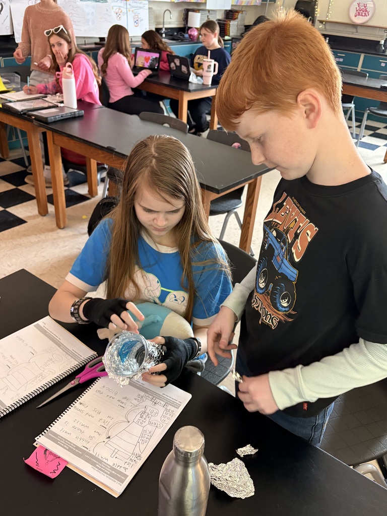 Students in Mrs. Garrett's 6th grade science class studying thermal energy transfer.