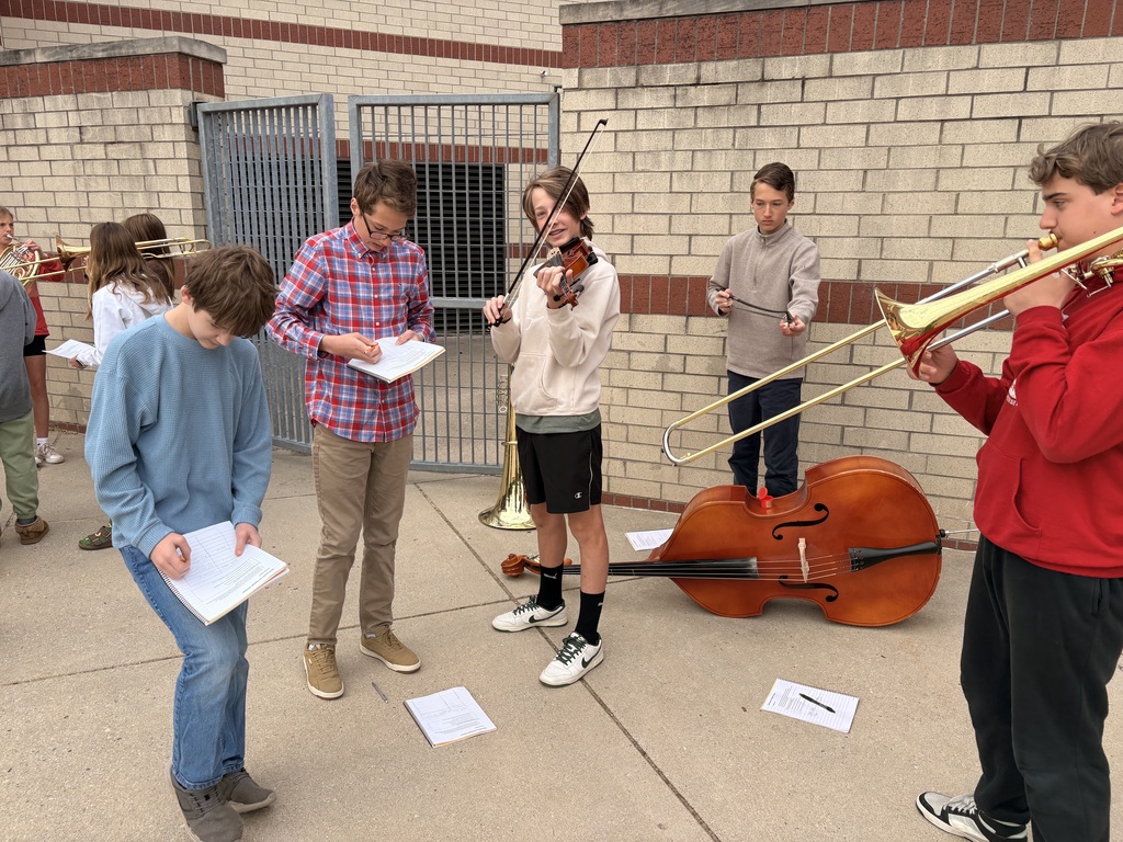 Science student's play instruments to investigate how instruments look, sound, and feel when they make sound.