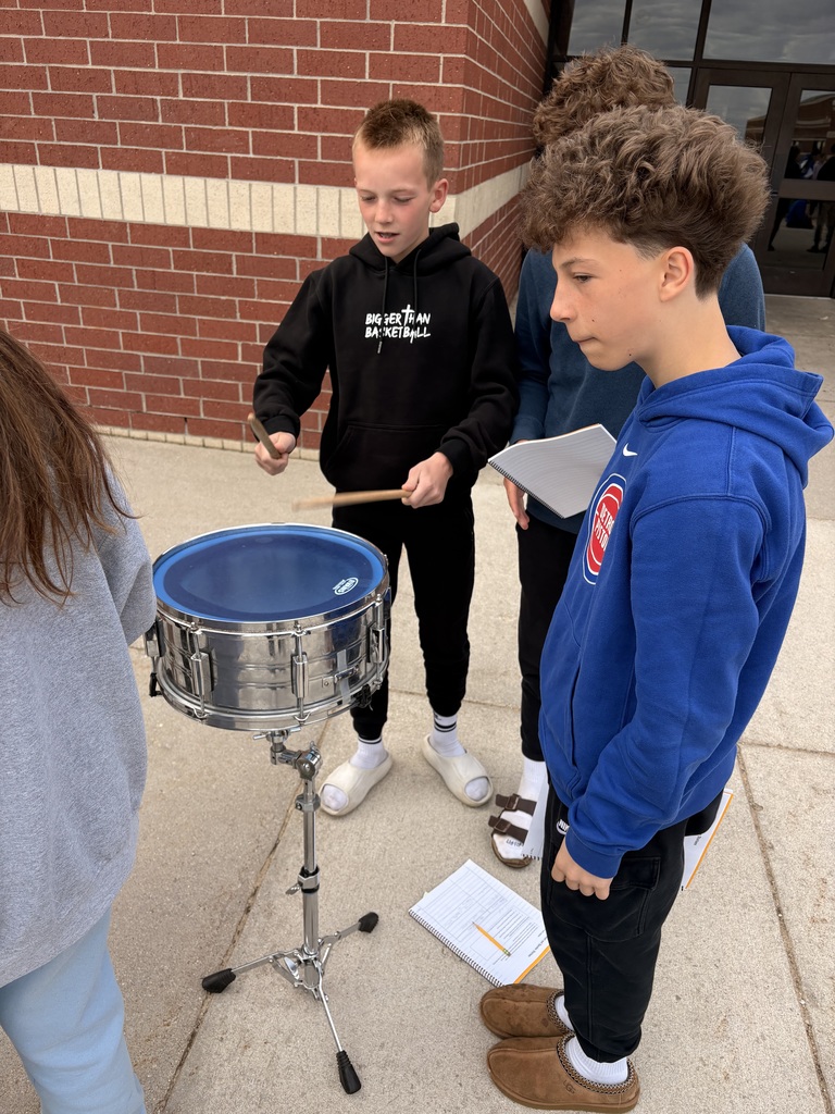 Science student's play instruments to investigate how instruments look, sound, and feel when they make sound.